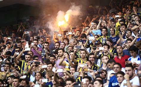 Fenerbahce players warm up in front of. Robin van Persie promises to help new club Fenerbahce ...