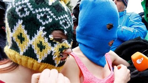 Pussy Riot Attacked With Whips By Cossack Militia At Sochi Cbc News