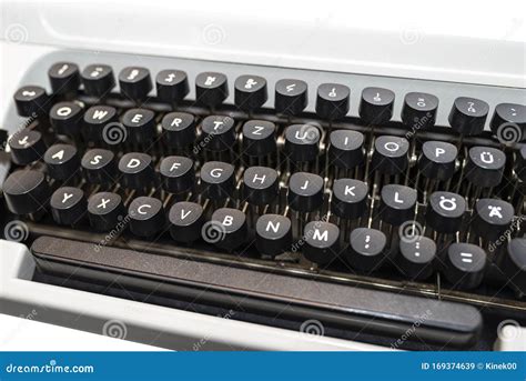 Classic Manual Typewriter In White With A German Keyboard Layout