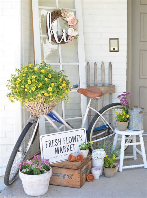 This front door decor is inspired by the beautiful color of the door itself. 15 Farmhouse Style Front Porch Ideas - Renewed Claimed Path