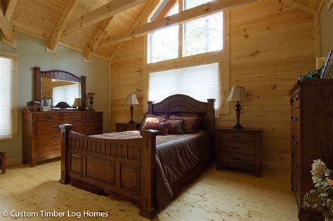 Cost to add a second story: Second Floor Bedroom in Log Home - Custom Timber Log Homes