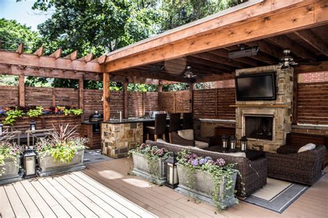Cozy outdoor kitchens create large impact with choice materials and quality appliances. Outdoor living garage roof deck at its best. This space ...