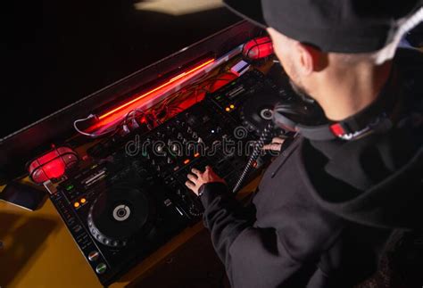 Dj Mixes Track At Nightclub Party Top View Of Disc Jockey In Smart