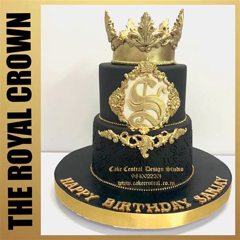 A Black And Gold Birthday Cake With A Crown On Top Is Featured In The