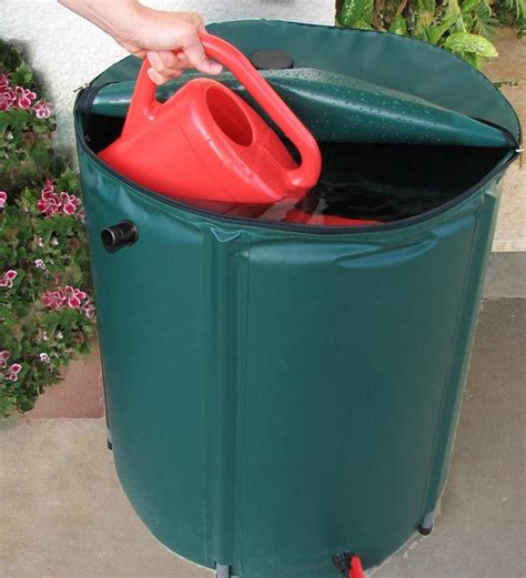 White/ blue plastic barrel, 55 gallon, use to contain medical grade concentrate acid. Collapsible 60 Gallon Rain Barrel | Outside Solutions ...