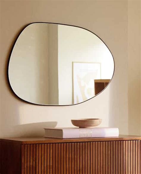 Your dream house is probably not going to be perfect in every way, but there's nothing worse than a poor living room design that never feels quite comfortable. Image 1 of the product SMALL IRREGULAR-SHAPED MIRROR ...