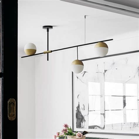 The designs make use of these natural materials in a manner that. Mid-Century Modern 3 Light Linear Ceiling Light in Black ...