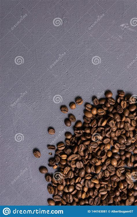 In any given space, dense coffee outweighs low density. Roasted Coffee Beans In Bulk On A Gray Concrete Background. Dark Cofee Roasted Grain Flavor ...