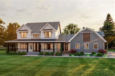 Exclusive Modern Farmhouse Plan With Side Load Barn Style Garage