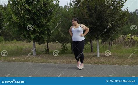 Fat Girl Runs Along The Road Stock Video Video Of Overweight Lady 127412159