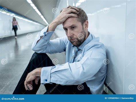 Sad Young Businessman Jobless Suffering From Depression Sitting