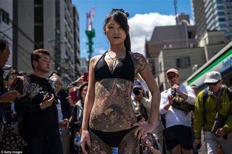 Yakuza Tattoos On Show As Men And Women Hit The Streets In Their