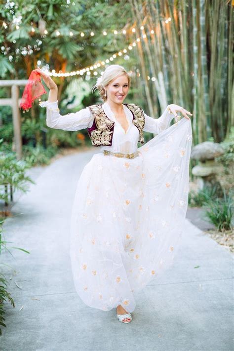 Albanian folklore songs can be divided into large groups, the heroic epics of the north, the sweet melodies of lullabies, love songs, wedding music, work songs and other types. For the reception, Lauren wore a 100-year old Albanian gown that has survived several wars, and ...