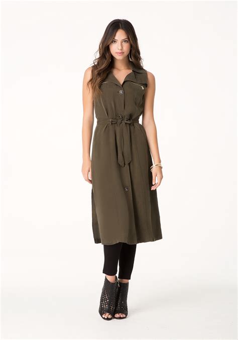An overcoat is simply a heavy coat that is worn over a suit or a jacket.it usually reaches between slightly above the knee to all the way down to the ankle. Lyst - Bebe Meena Duster Trench Coat in Green