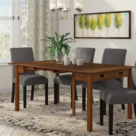 Expect narrow legs on chairs and tables, and single colours throughout, be it black, white or some subtle pastel shade. Berkshire Extendable Dining Table in 2020 | Narrow dining ...