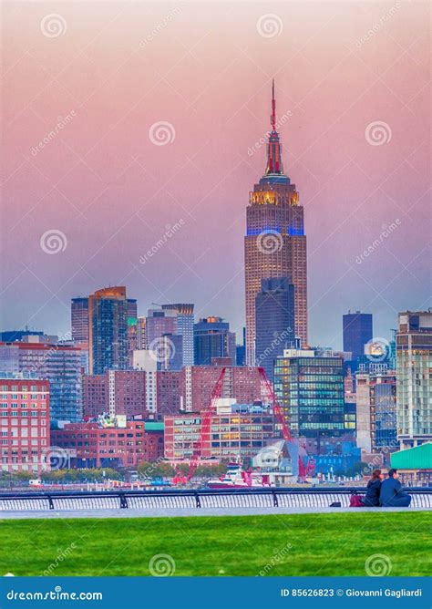 Manhattan Skyline From Jersey City Park At Sunset Editorial Stock Photo