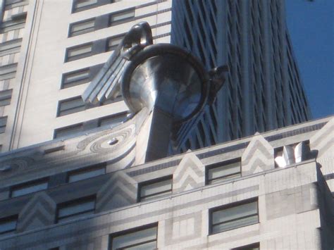 Especially the building's gargoyles were modeled after chrysler automobile products like the hood chrysler buildingart deco in france found its american equivalent in the design of the new york. Chrysler Building spire with gargoyles 6977 | Chrysler ...