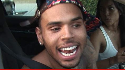 chris brown on tight leash for charity trip no funny business
