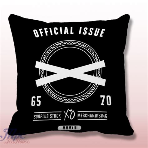A Black Pillow With White Tape On It And The Words Official Issue