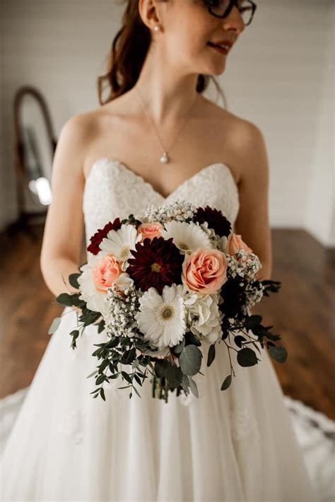 Modern bouquets & unique plants designed to impress. Burgundy dahlias White gerbera daisies blush roses babys ...