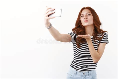 Flirty And Sensual Cute Redhead Girl In Striped T Shirt Posing Silly