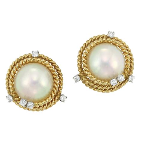 Pair Of Gold Platinum Mabe Pearl And Diamond Earclips Tiffany And Co
