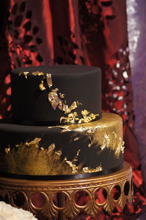 Black Fondant Wedding Cake With Painted Gold Black Gold Wedding Cake