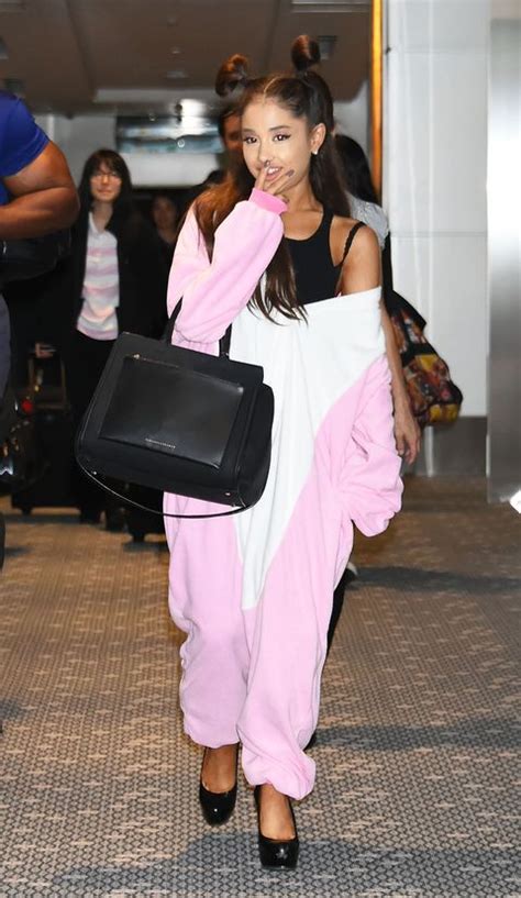 Ariana Grande Dressed Like A Giant Pink Unicorn At The Tokyo Airport
