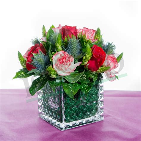 Red Roses With Carnation In Square Glass Vase