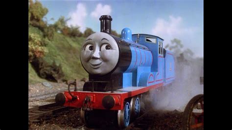 He is painted blue with red stripes. Edward the blue engine rock - YouTube
