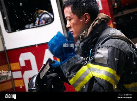 Firefighter In Action New York Stock Photo Alamy