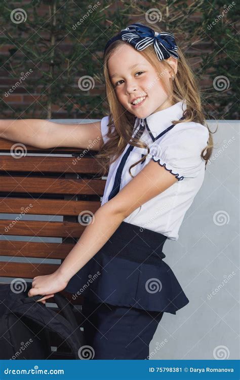 Schoolgirl In Uniform Waiting For The Bus To School Stock Image Image Of Person Girl 75798381
