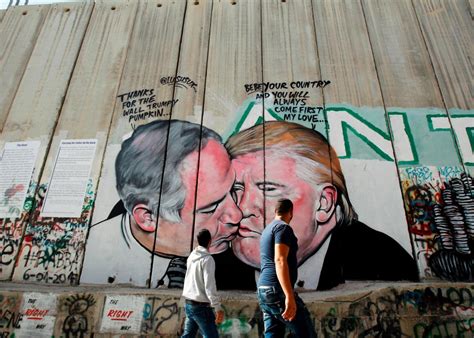 Mural Depicting Trump And Netanyahu Sharing A Kiss Pops Up On West Bank Wall