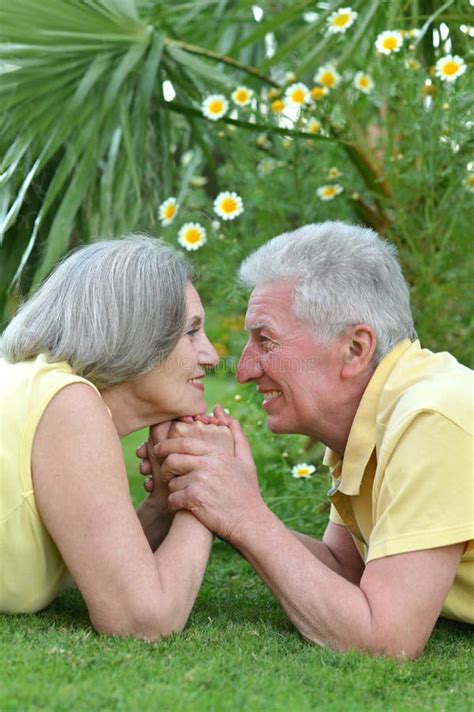 Mature Couple Laying On Grass Stock Image Image Of Natural Mature
