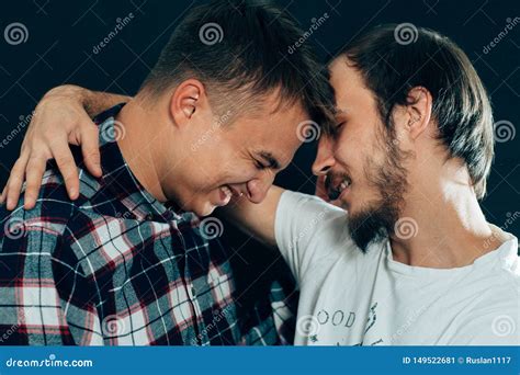 Two Guys Hugging On A Dark Background Stock Image Image Of Friends