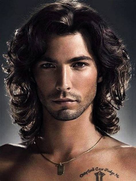 Hair with a bit of curl and wave is best sho. Men With Feminine Long Hairstyles - Wavy Haircut