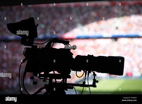 Camera In A Stadium During A Football Match Stock Photo Alamy