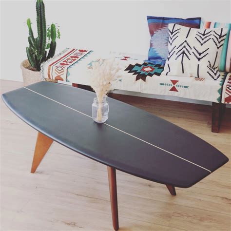 A solid walnut base and spindle shelf gives you room to stash your latest design magazines, favorite architecture books, and that handmade ceramic bowl you picked up the last time you were in hawaii. The Surfboard Coffee Table - B59 Edition | Surfboard ...