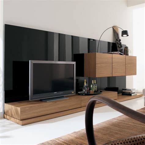 From elegant looking wooden bedroom wall units, to intricately designed ones, you have a wide range of tv entertainment units to choose. Stylish Modern Wall Units For Effective Storage - DigsDigs