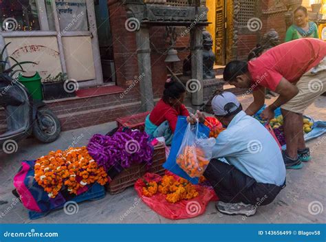 Buying Marigold Flowers For Tihar Deepawali Festival And Newari New