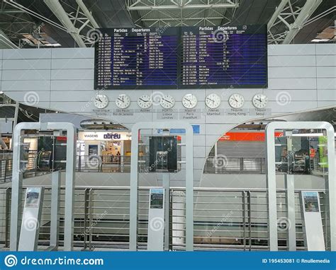 Departure Table With World Clocks And Flight Times Editorial Photo