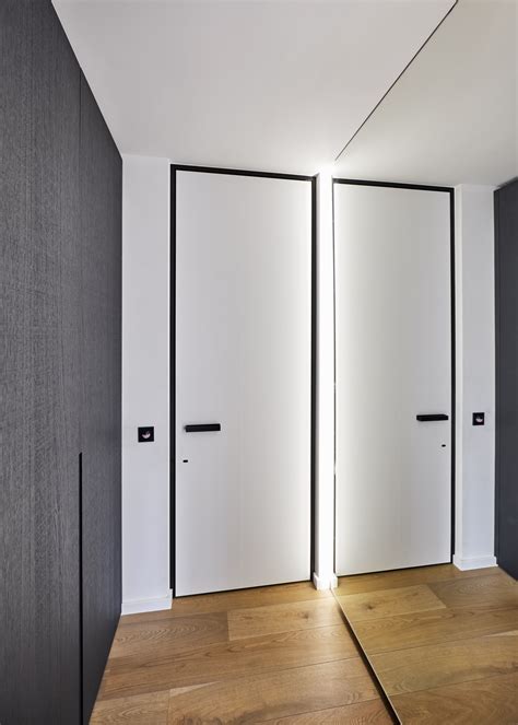 Modern White Interior Door With A Black Door Frame And Black Door