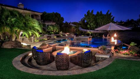 Tropical Pool Oasis With Water Features And Fire Pit Hgtv Ultimate Outdoor Awards 2016 Hgtv