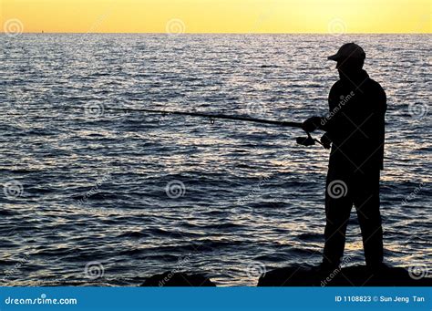 Fisherman At Sunset Stock Image Image Of Scenery Reel 1108823
