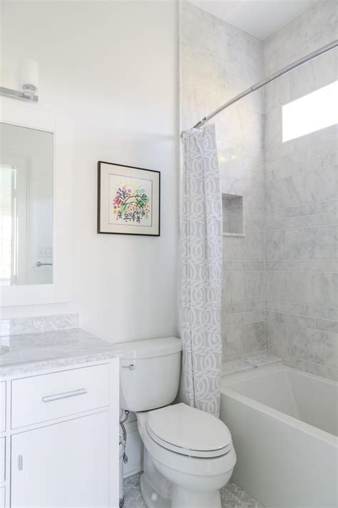 Take a tour with hgtv magazine. White Bathroom With White Marble Backsplash | HGTV