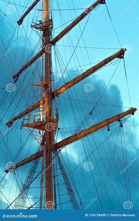The Mast Of A Large Sailing Ship Against The Background Of The Heaven