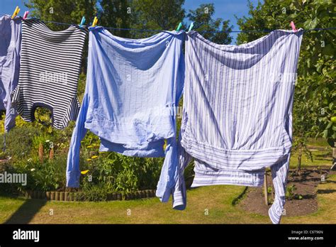 Washing Hanging On Clothes Line Stock Photo Alamy