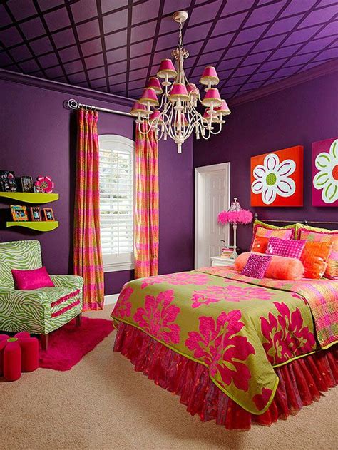 A purple primary bedroom boasting a gorgeous purple bed and a purple couch, along with three windows both with purple window curtains. Purple Glam Deep purple walls and ceiling create a ...