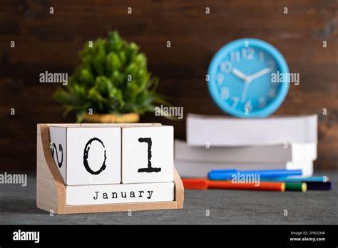 January 01st January 01 Wooden Cube Calendar With Blur Objects On