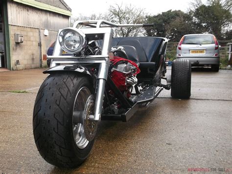 The seat was mounted behind the engine so not to burn the rider. Custom built Rover V8 trike